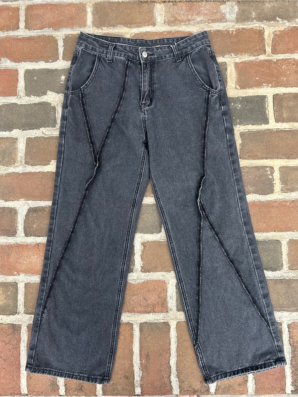 Aelfric Eden washed black baggy jeans with patchwork frayed edges 28
